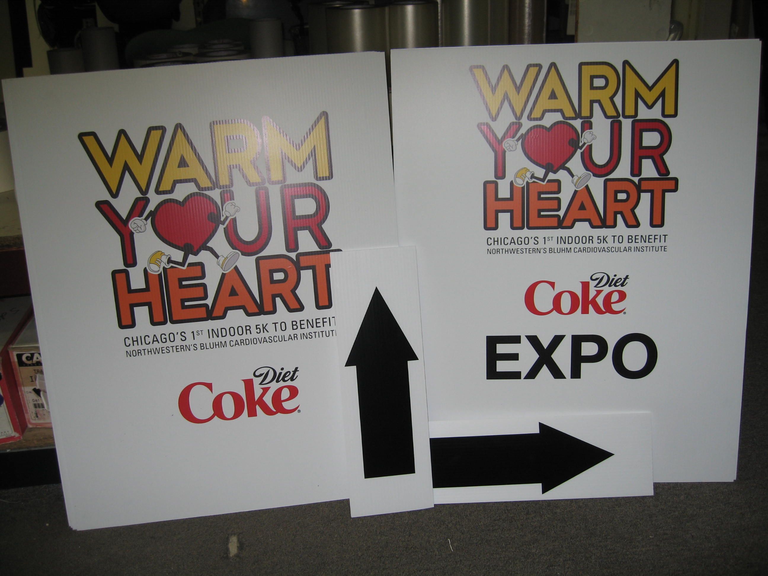 Warm Your Heart event signs